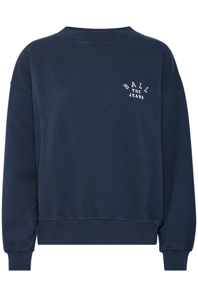 Marineblå sweatshirt med rund hals og lange ærmer. Tekst "BALL THE JEANS" på brystet.