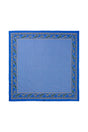 Lollys Laundry JennaLL Big Scarf in blue, made of 100% cotton, featuring a floral border and geometric pattern, shown flat.